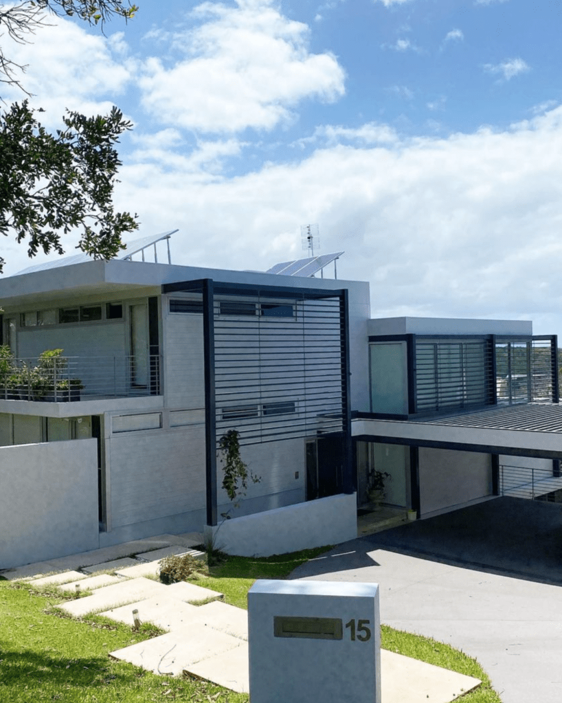 modern large home painted white